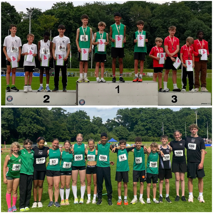 Jugendliche Athleten stehen auf einem Siegertreppchen und posieren in Teameinheit auf einem Sportplatz.