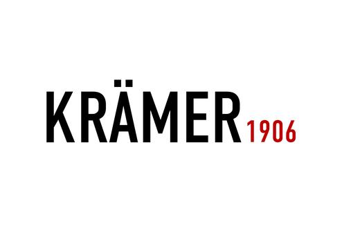 Logo von Krämer 1906, schwarz-rote Schrift auf weißem Hintergrund, betont den Markennamen und das Gründungsjahr.