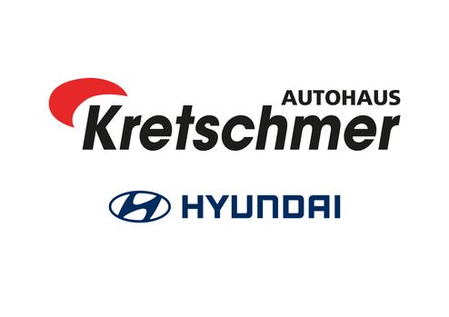 Logo von Autohaus Kretschmer über dem Hyundai-Logo auf weißem Hintergrund.